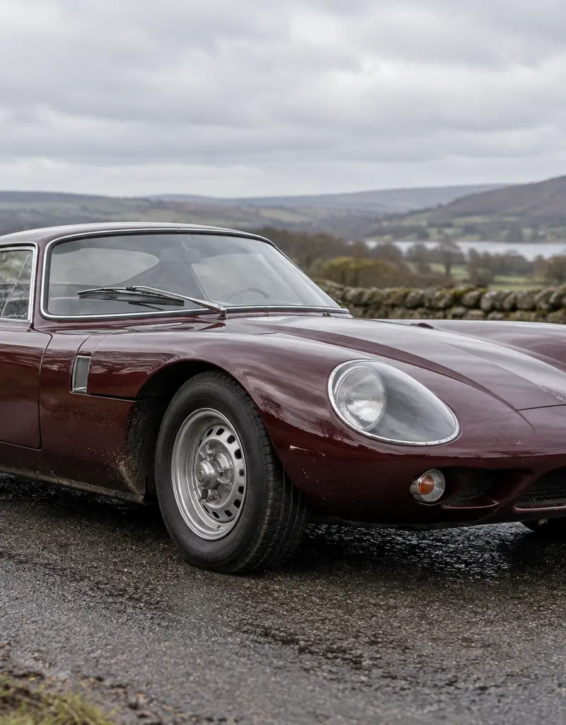 Waarom heeft de Marcos 1800 GT een houten chassis?